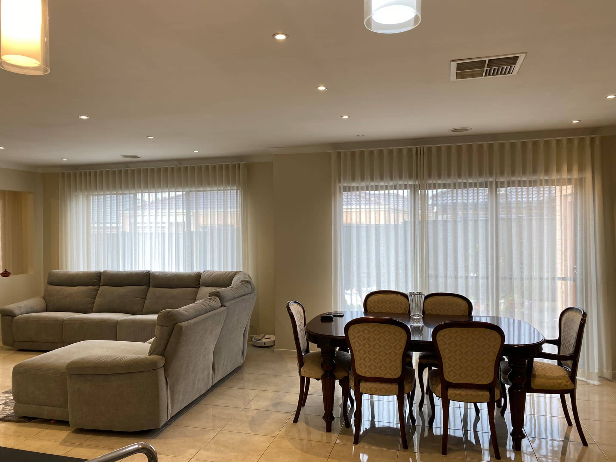Sheer curtains in a Melbourne living room by Maple Blinds